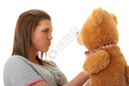 带着泰迪熊的漂亮少年女士动物成人玩具快乐女性喜悦安全青年蓝色图片