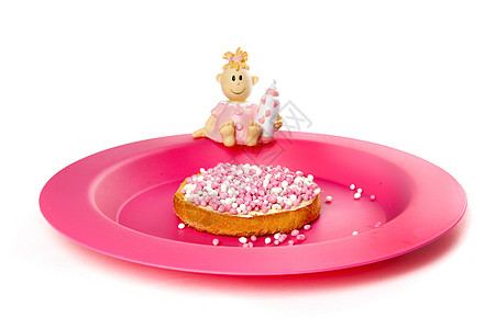 鲁石生日粉色白色玩具小吃糖果食物女婴饼干盘子高清图片