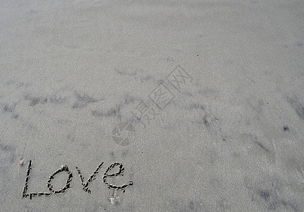 爱在沙沙中棕褐色海洋海浪泡沫写作图片