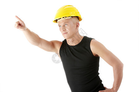 黄色头盔的建筑工指向上面房子劳动工具男人金属职业帽子建设者企业家制造业图片