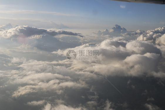 云飞行地平线鸟瞰图白色天空航班航空公司风景蓝色日落图片