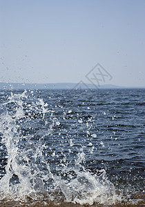 舞蹈水域海滩海洋液体乐趣旅行天气碰撞石头娱乐蓝色图片