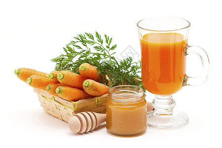 一杯新鲜的胡萝卜汁加蜂蜜图片