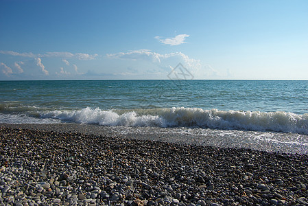 浮度海滩海岸天空海洋太阳泡沫海浪石头图片
