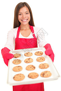 孤立的妇女烤饼干图片