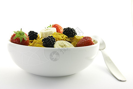 玉米片和水果 在白碗里与勺子饮食浆果早餐小吃玉米小麦厨房谷物蜂蜜营养图片