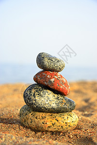岸边的石头场景海岸线福利平衡卵石命令海浪温泉闲暇文化图片