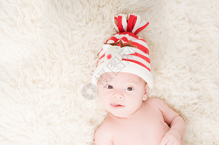 戴着礼服帽的新生儿新生毛皮帽子条纹红色婴儿材料男生孩子童年图片