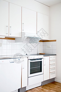 现代化的现代厨房内奢华风格白色内阁食物财产房间柜台器具房子图片