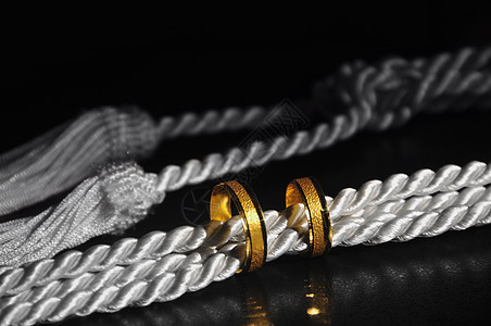 结婚戒指男性婚礼女性绳索摄影婚戒金戒指图片