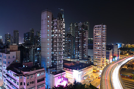 晚上在香港房子建筑物交通高峰中心灯泡经济高楼带子汽车图片