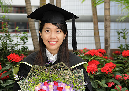 脱离亚洲女童毕业学生少数民族冒充微笑头发中学研究生学校女士快乐图片