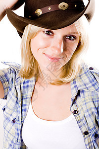 西方漂亮女子快乐棉布牛仔裤金发女郎白色帽子衬衫牛仔女性蓝色图片