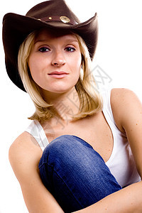 穿着帽子的漂亮西雅漂亮的女士女性蓝色微笑金发女郎快乐棉布衬衫成人牛仔裤牛仔图片