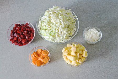borsch 的成分烹饪厨房洋葱蔬菜紫色黄色土豆美食红色白色图片