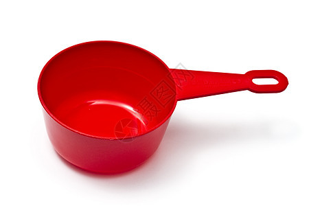 白色上孤立的红色塑料测量杯勺子烹饪厨房美食金属餐厅用具工具宏观测量图片