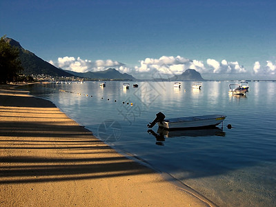 美丽的海滩风景阳光热带旅游异国假期天空天堂情调娱乐遮阳棚图片