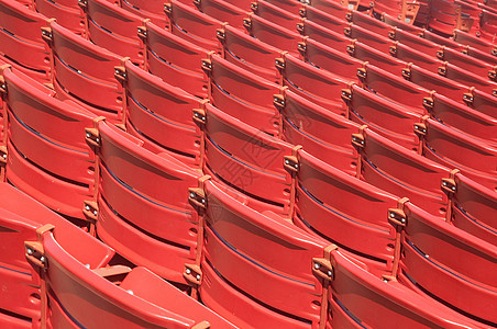 礼堂座位红色运动竞技场椅子塑料剧院体育场图片