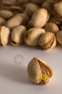 Pistachios 螺旋藻贝壳味道市场早餐小吃食物棕色绿色水果蔬菜图片