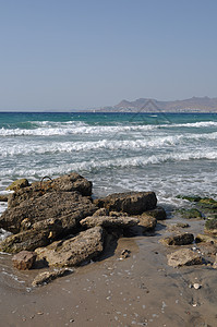 科斯海滩海景旅行海浪岩石支撑海洋假期海岸线天空场景图片
