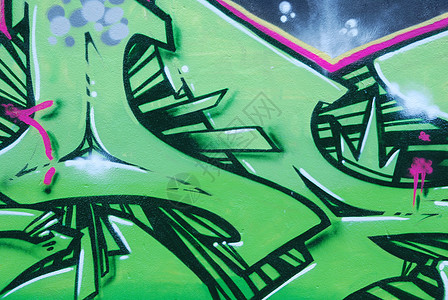 墙上彩色涂鸦的片段街道艺术水平墙纸紫色绿色活力图片