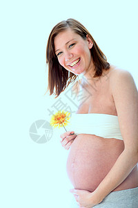 怀孕 微笑 快乐的有婴儿肚子的女人图片