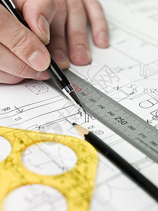 建筑师在做一个蓝图电脑文档艺术家统治者工具住宅结构房屋绘图笔记本图片