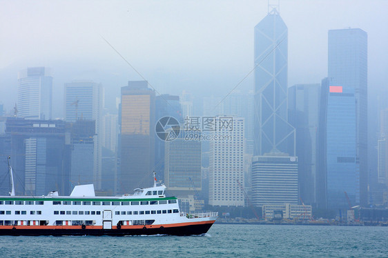 烟雾中的香港海洋天际邮轮血管领土巡航乘客渡船摩天大楼渠道图片