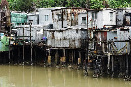 Tai O 香港一个小渔村木头钓鱼窝棚村庄风化住宅天空场景蓝色旅行图片