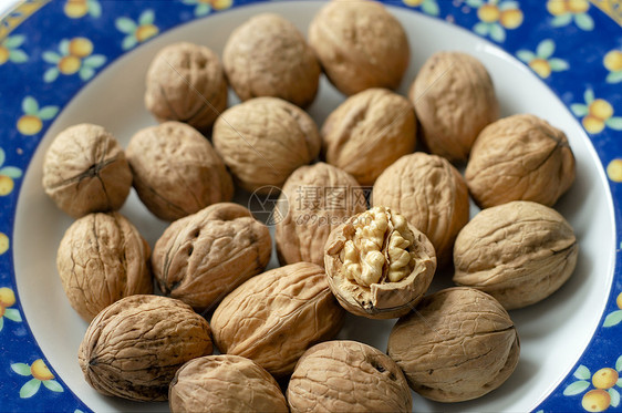 胡桃小吃盘子种子蔬菜坚果季节核桃宏观烹饪传统图片