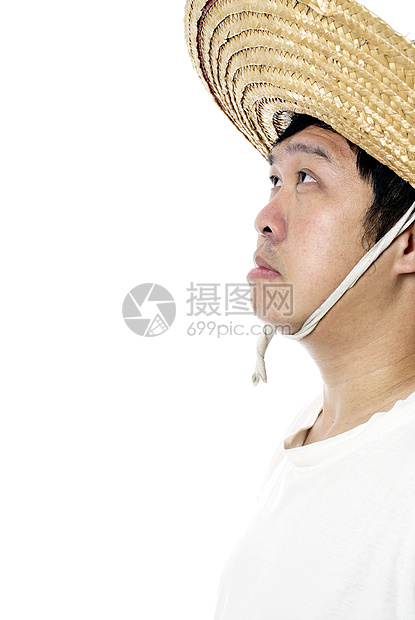 亚洲农民仰望着白戴草帽的白衣亚洲农民图片