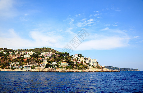 亿万富翁在尼斯海滩前线的房子晴天假期桅杆黄色游艇港口天空城市旅行图片
