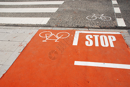 带有停止标志的橙色自行车车道警告行人线条危险橙子安全娱乐适应症路线地面图片