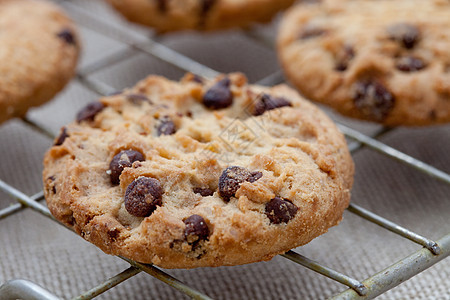 自制巧克力薯饼饼干小吃麻布诱惑育肥饮食食物棕色材料背景图片