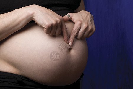 怀孕肚子子宫母亲营养联盟情感亲子关系食物孩子父母图片
