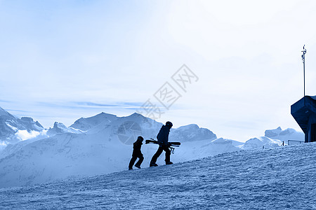 滑坡斜坡天空高地阳光滑雪滑雪者冰川岩石地形闲暇蓝色图片