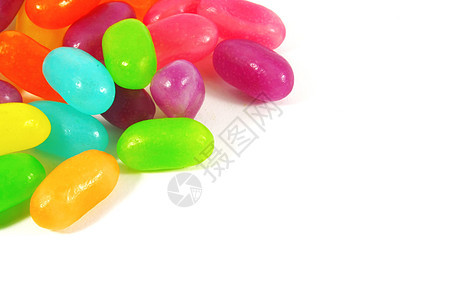 果冻豆白色味道软糖食物团体小吃蓝色水果零食紫色背景图片