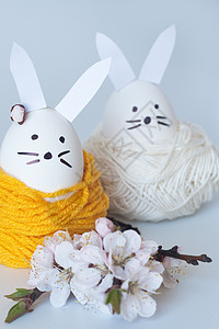 装饰复活节兔子和樱花花新娘绿色树枝紫色婚礼绞线耳朵花朵黄色粉色图片