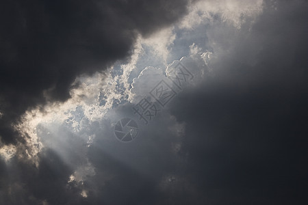 暗云太阳雷雨季节天空天气美丽压力危险隐藏阳光图片