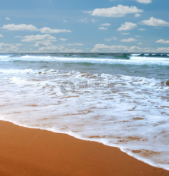 美丽的海滩波浪海洋辉光破坏阳光海湾季节风景天空热带图片