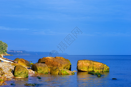 水边岩石石头鹅卵石支撑边缘天空悬崖海洋海岸巨石图片