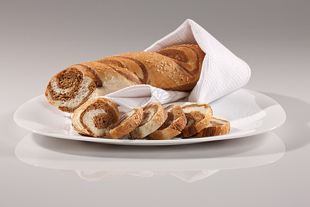 面包餐巾白色种子盘子食物背景图片