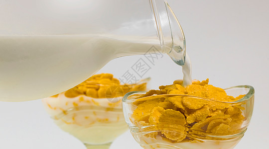 玉米花和牛奶早餐玉米片静物美食投手餐厅午餐盘子烹饪图片