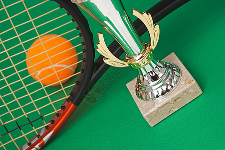 赢得网球锦标赛杯子金子运动游戏球拍白色优胜者竞赛绿色庆典图片