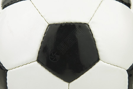 黑色和白色皮革足球近距离拍摄背景图片