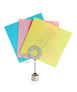 书架上的纸面注释粉色蓝色办公室黄色床单背景图片