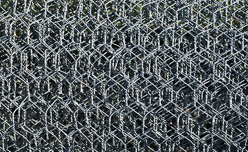 线网网格栅金属栅栏工业安全背景图片