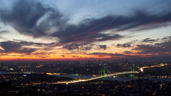 Bosphorus桥日落旅行景观路灯火鸡建筑学钢缆摩天大楼城市建筑图片
