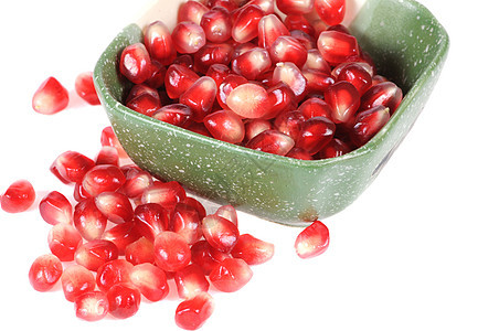 石榴谷物红色宏观颗粒状水果甜点种子植物盘子食物图片