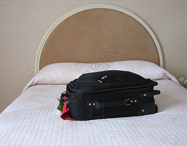 旅行者床头柜旅行客栈行李休息旅馆款待枕头旅游游客图片